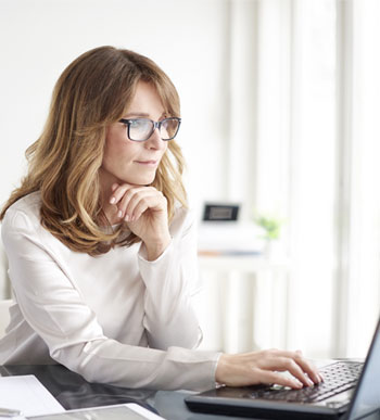 Woman working on a laptop computer